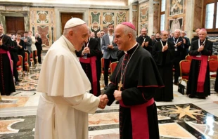 Pope Francis greets Archbishop Rino Fisichella in the Vatican's Clementine Hall, Sept. 17, 2021. Vatican Media.